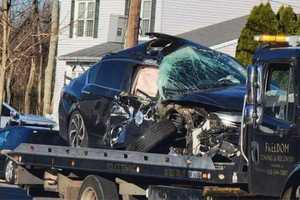 Unbuckled Woman Critical After Running Stop Sign, Striking Garbage Truck In Toms River: PD