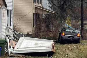 Car Rips Off Home's Front Porch In Warren County Crash