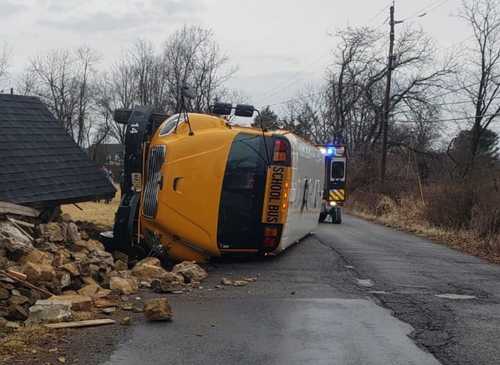 Children, Driver Hospitalized As School Bus Overturns, Hits Historic ...