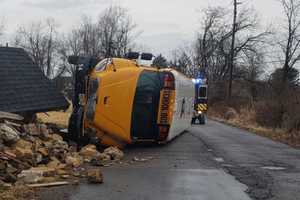 Children, Driver Hospitalized As School Bus Overturns, Hits Historic Hunterdon County Building