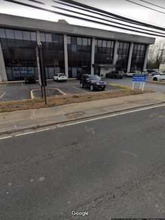 Man Threatens To Jump From Roof Of Suffolk County Bank