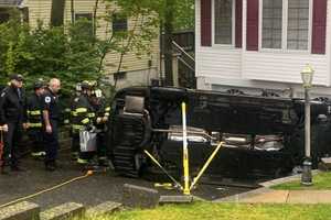 Driver Moving Cars Flips Sedan In Paramus Driveway (PHOTOS)