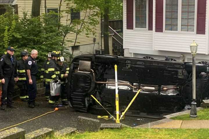 Driver Moving Cars Flips Sedan In Paramus Driveway (PHOTOS)