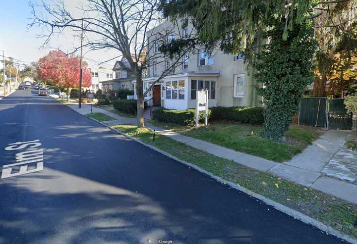 The body was found at the Suffolk Motel on Elm Street in Huntington.