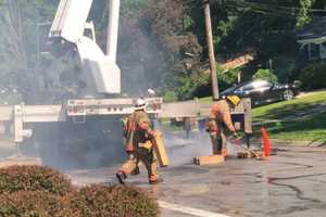 Crane Downs Live Wires Causing Fire In Colesville