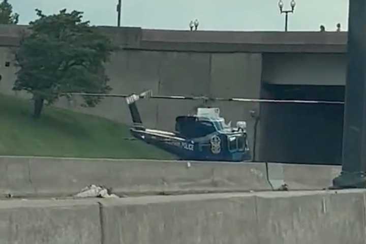 Helicopter Lands On I-395 To Assist Officer, Driver Captures It All