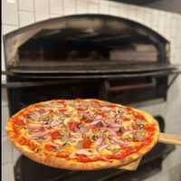 <p>Tesoro Ristorante and Pizzeria offers brick oven and artisan pizzas.</p>