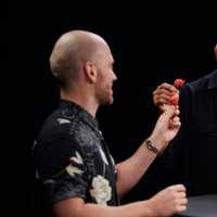 <p>Sean Evans and David Blaine prepare to eat Carolina Reapers.</p>