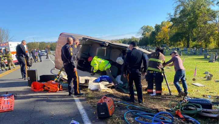 A toddler was rescued and a driver nearly impaled by a fence post in a rollover crash in Hunterdon County, authorities said.