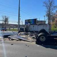 <p>The overturned truck</p>