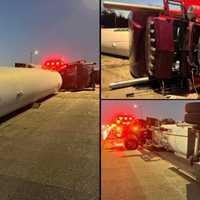 <p>The overturned propane truck shut down lanes in both directions on Route 50.</p>