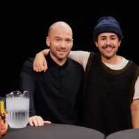 <p>Ramy Youssef and Hot Ones host Sean Evans.</p>