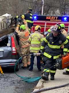 One Airlifted After Machinery Falls Off Hunterdon County Dump Truck, Impales SUV Roof: UPDATE