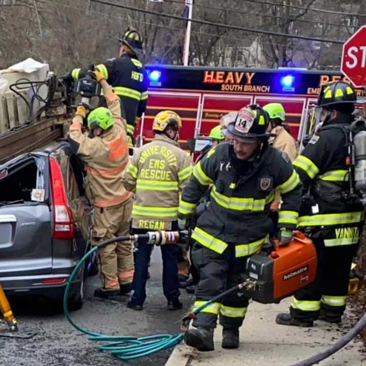 A 47-year-old driver was flown to a nearby hospital after a piece of machinery fell from a dump truck towing a well-drilling machine, impaling the roof of an SUV in Hunterdon County Thursday afternoon, authorities said.