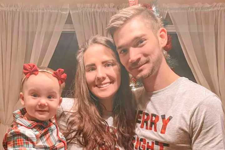 James Davis III with his wife, Nicole, and their daughter, Elliana.