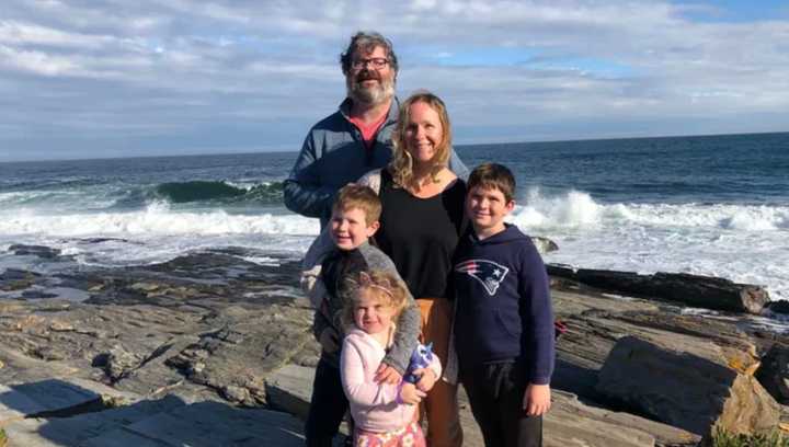 Teddy Higgins (back) with his wife Sadie (center) and their three children (front)