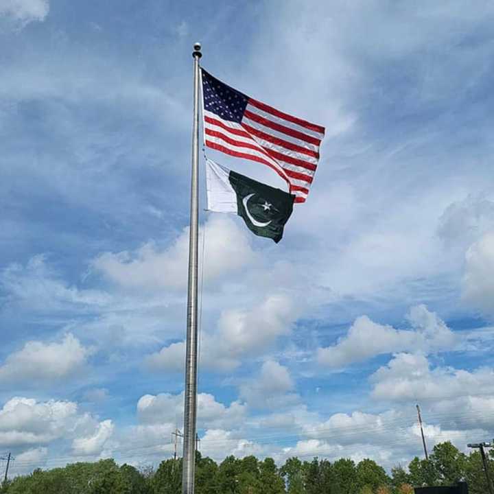 The Pakistani flag fliew with the American flag at Edison Municipal Building last summer. The mayor said other foreign flags would be flown there to reflect the diversity of the community.