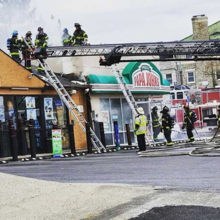 The Papa Johns caught on fire around noon