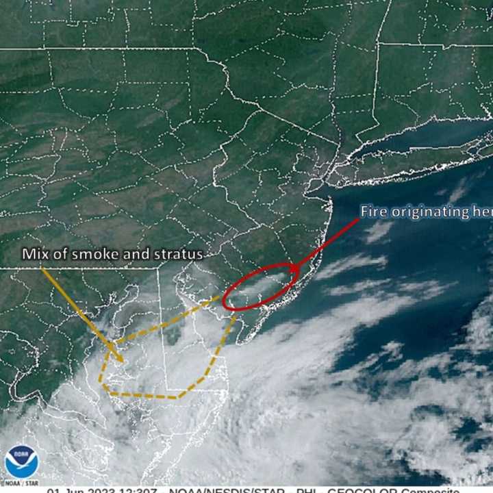 The area circled from this satellite view shows high concentrations of smoke due to a wildfire at Bass River State Forest, according to the National Weather Service.