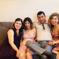 <p>Fardin Ghadami Darounkolaee with wife Sonia and daughters Sona and Mona.</p>