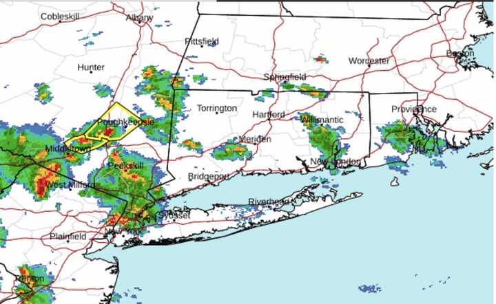 A radar image showing severe storms (marked in orange and red) sweeping through the region from the west to the east at around noontime on Monday, June 26.