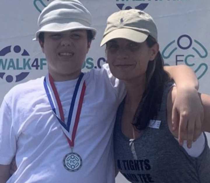 Christine Gallinaro and her son, identified only as J.G., who has autism.