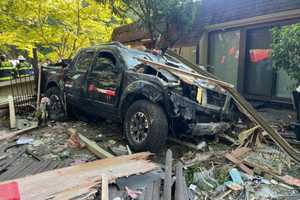 Pickup Driver Smashes Into Home In Howell