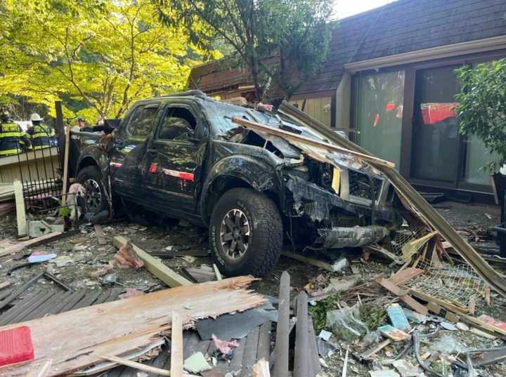 A pickup smashed into a home on Wednesday, Aug. 2 in Howell.