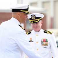 <p>Cmdr. Scott Bresnahan, left, shakes hands with Cmdr. Kyle McVay after being relieved as commanding officer of the USS Indiana (SSN 789) during a change-of-command ceremony in Groton, CT, on June 23.</p>