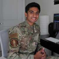 <p>Dhruva Poluru, seen here at his home office in Herndon, has been named the Airman of the Year for the 500,000-member total Air Force.</p>