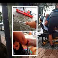 <p>Lieutenant Paul Cataline and Officers Andriy Shevchuk and Carissa Pagnotta rescue a woman in distress in the water after a waverunner crash in the Metedeconk River.</p>