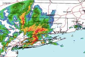 Storm System Packed With Drenching Downpours Sweeping Through Region