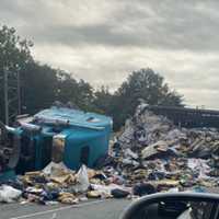 <p>An overturned tractor trailer closed Route 17 in Mahwah Friday morning, Sept. 8.</p>