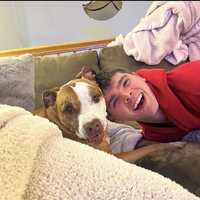 <p>Devin Wolfe and his dog, Spliffy.</p>