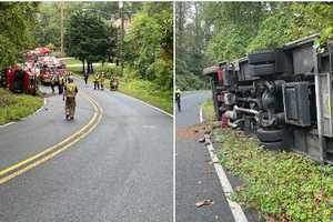 Ambulance Overturns On Slick Maryland Roads