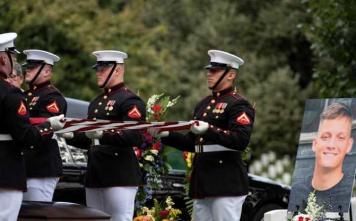 Marines from the Marine Barracks, Washington, D.C. (8th and I) conduct military funeral honors for U.S. Marine Corps Cpl. Spencer Collart in Section 52 of Arlington National Cemetery, Arlington, Va., Sept. 25, 2023.