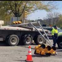 <p>An elongated tractor trailer took down a traffic control signal in a tight turn at a Paramus intersection Tuesday, Oct. 10.</p>