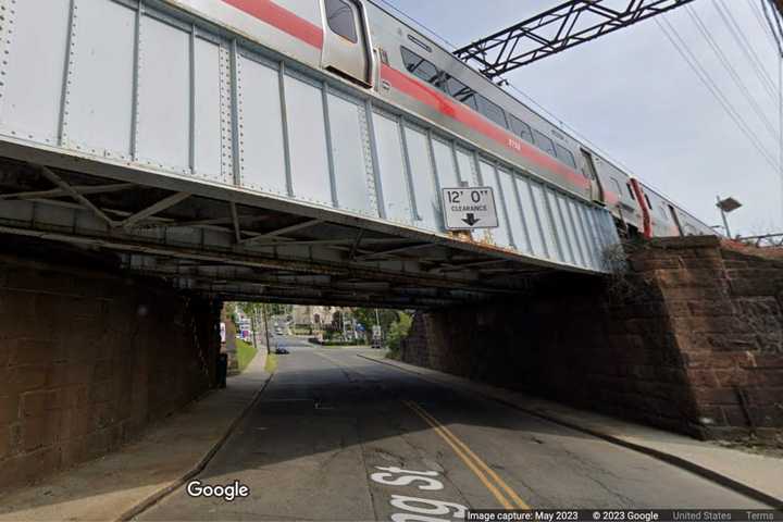 Tractor-Trailer Becomes Lodged Under Train Overpass In Port Chester, Closes Road