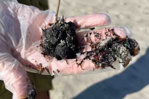 Mysterious Tar Balls Found On NJ Beaches Prompts Coast Guard Investigation