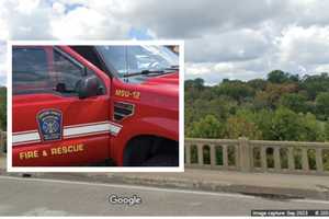 Rising Waters Trap Homeless Woman Under Falmouth Bridge, Firefighters Make Challenging Save