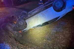 Unlicensed DUI Driver, Passenger Escape Flipped Car In Stafford: Sheriff