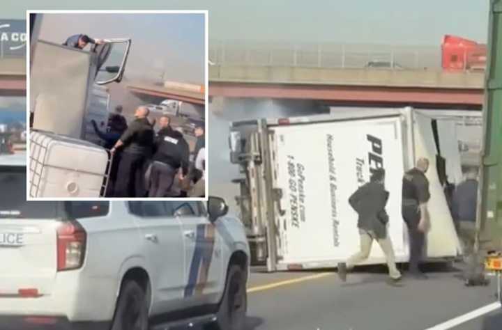 New footage shows a Penske truck overturning on the NJ Turnpike after a nearly 50-mile pursuit.