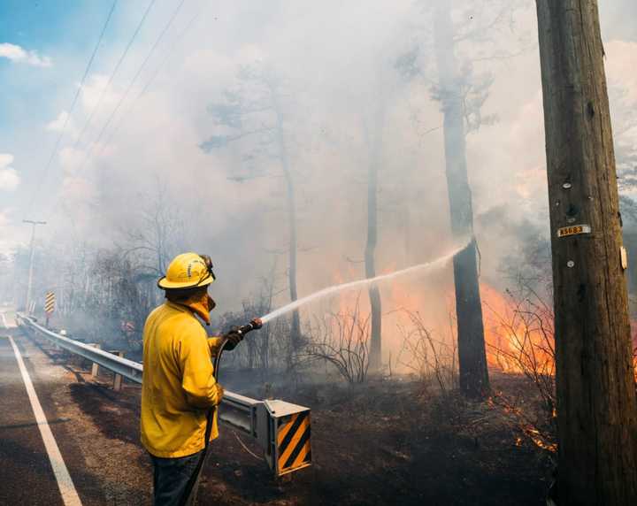 Firefighters battled a wildfire along Jackson Road at Wharton State Forest in April 2024.