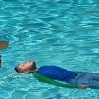 <p>Lucas enjoys swimming in pools, which he can do pain-free, his family said.</p>