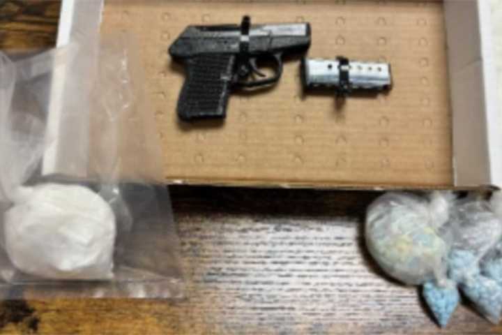 Duo Caught With Gun, Cocaine, Pills In Car's Hidden Compartment In Westchester: Police