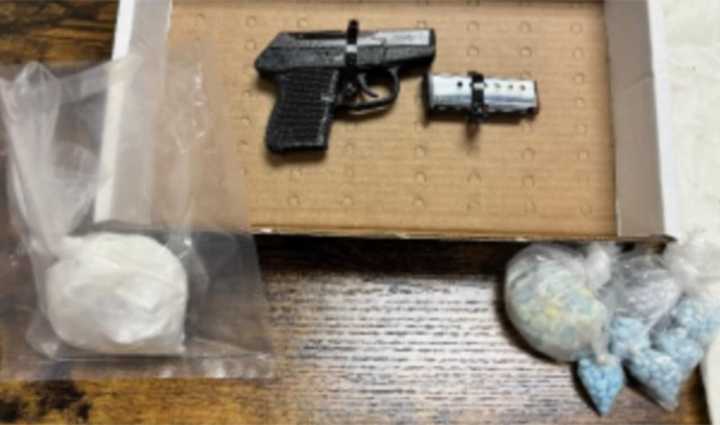 The narcotics and handgun recovered after the traffic stop.