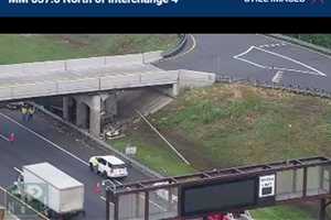 Tractor Trailer Overturns, Becomes Wedged Under Overpass On NJ Turnpike