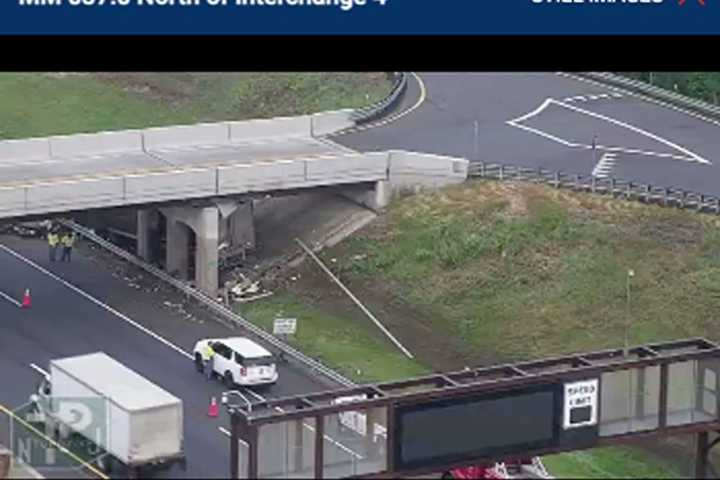 Tractor Trailer Overturns, Becomes Wedged Under Overpass On NJ Turnpike In Mount Laurel