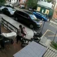 Woman With Small Child Seen Taking Package From Hoboken Stoop