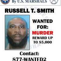 <p>Russell T. Smith, of Windsor, is suspected in the killing of two brothers outside of a Bloomfield bar on Feb. 22, police said.</p>